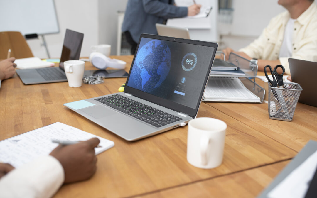 Modern setup showcasing office technology, including laptops and collaborative tools.